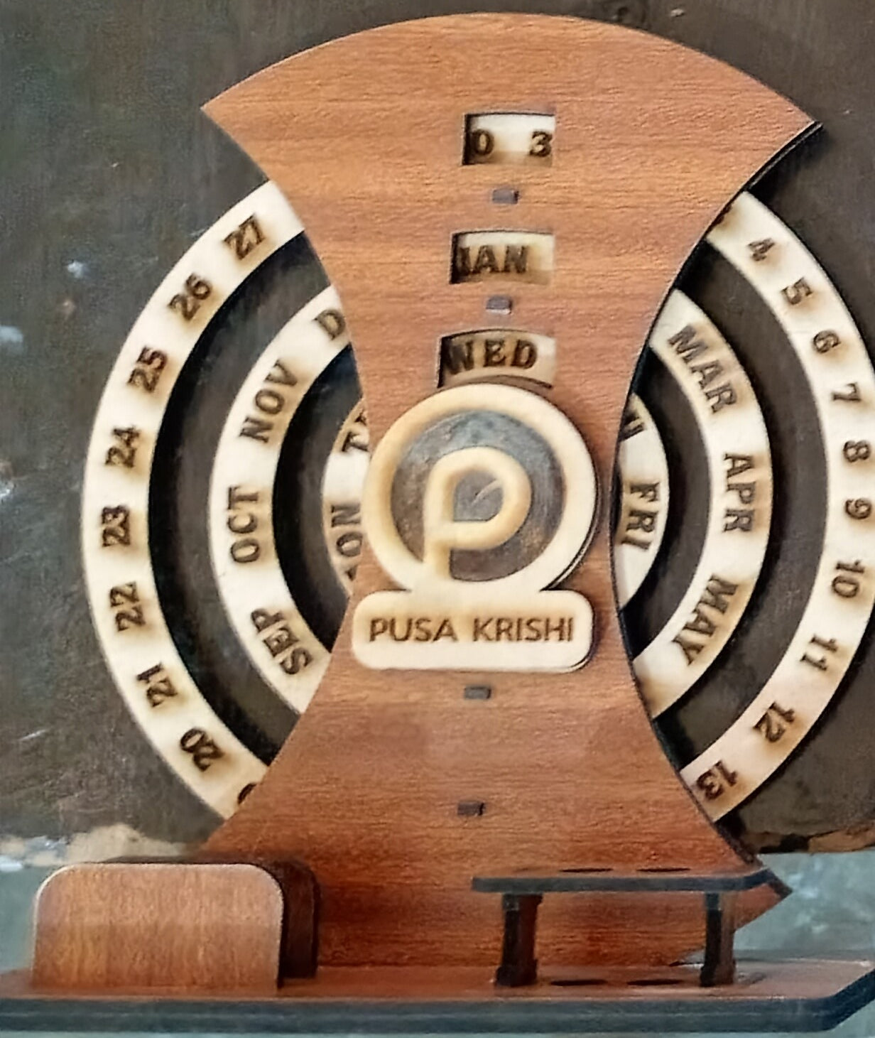 Taksha-Round Calender